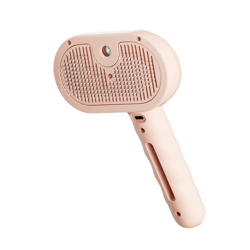 Pet grooming brush spraying fine mist while brushing a cat's fur