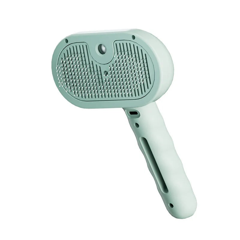 Pet grooming brush spraying fine mist while brushing a cat's fur