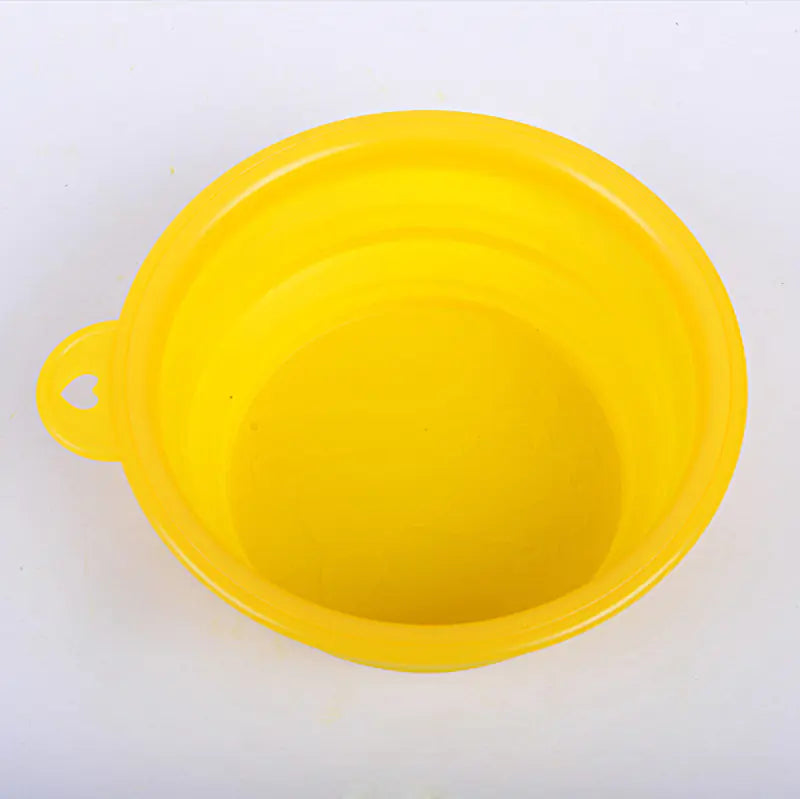 Collapsible silicone pet bowl for dogs and cats in yellow