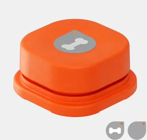 Dog using pet communication button to play recorded message